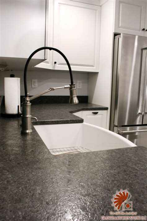 best cabinet color with steel gray lethered granite|grey granite countertop pairing.